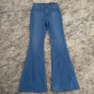 Fashion Nova- Deep In My Soul Flare Jeans - Medium Blue Wash. Size: 11